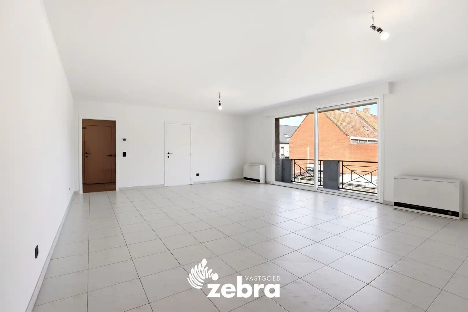 Zeer ruim appartement (137 m²) te koop met dubbele garage in het hartje van Tielt! foto 5