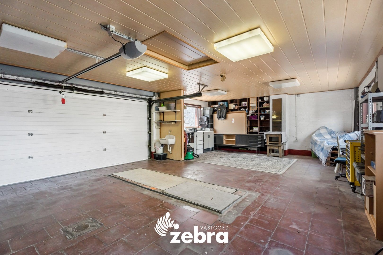 Instapklare woning met grote garage en 3 volwaardige slaapkamers! foto 9
