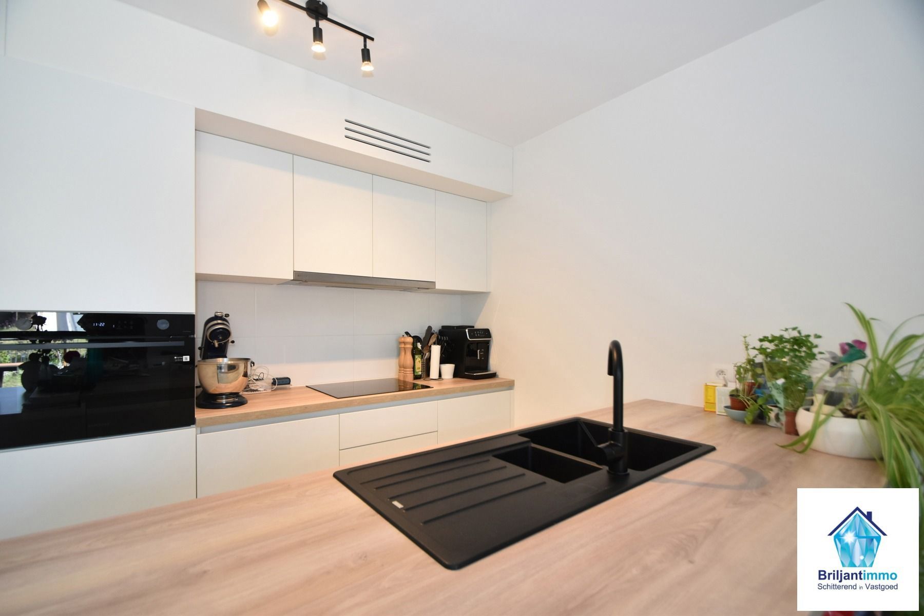 Energiezuinig gelijkvloers appartement met 3 slpkmrs & tuin foto 3