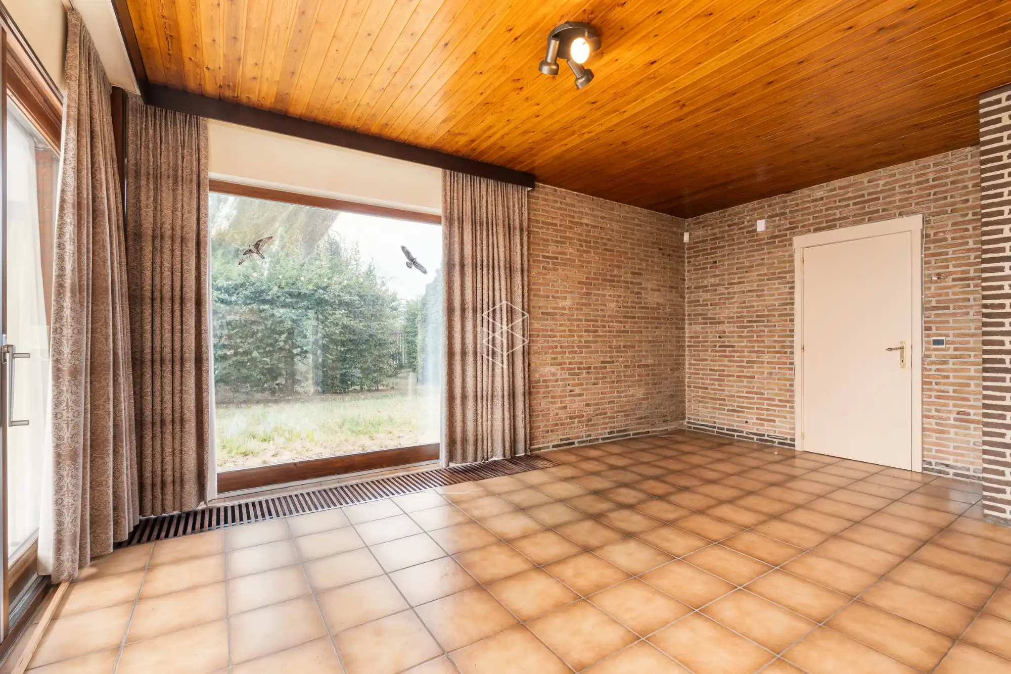 Centraal gelegen gelijkvloerse woning met royale tuin op 1656m² foto 12