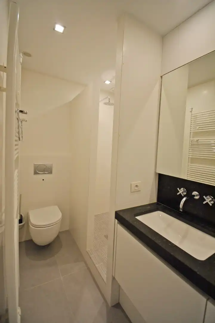 Ruim en lichtrijk hoek appartement met 2 slaapkamers foto 21
