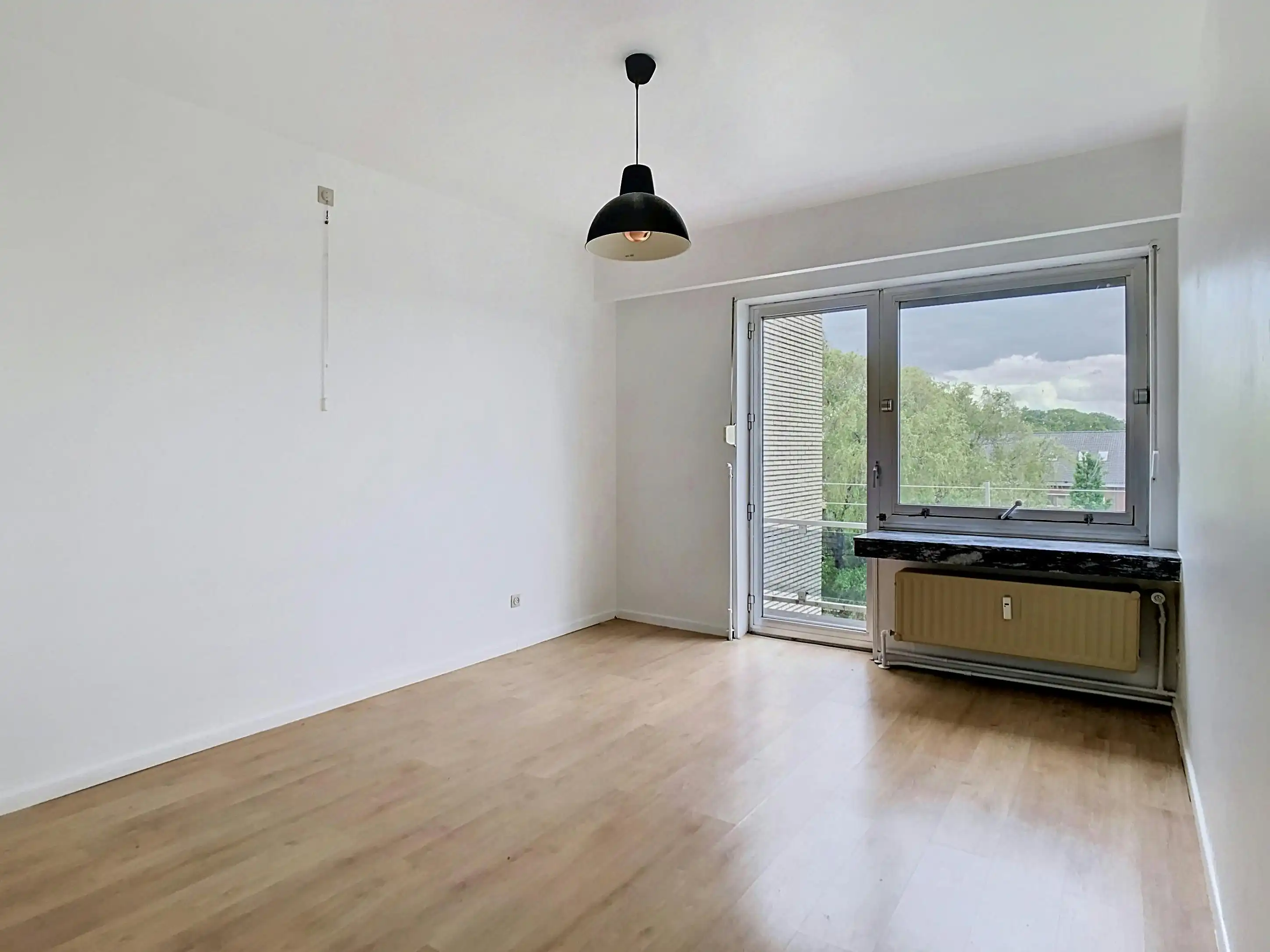Lichtrijk en centraal gelegen ruim appartement met garage foto 17