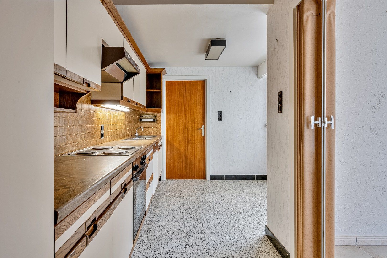 Halfopen charmante woning op toplocatie. foto 9
