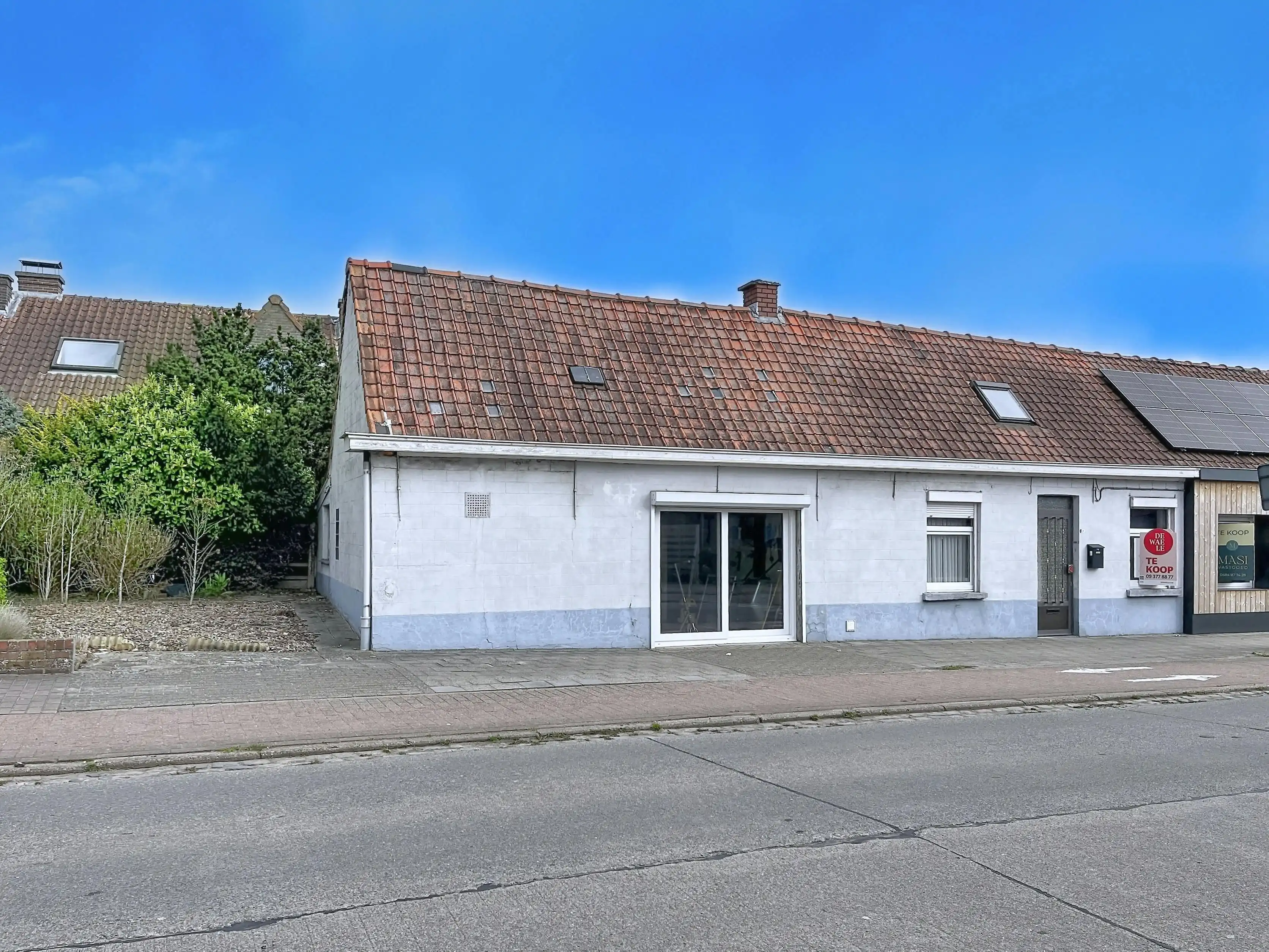 Te renoveren woning in het centrum van Ursel foto 15