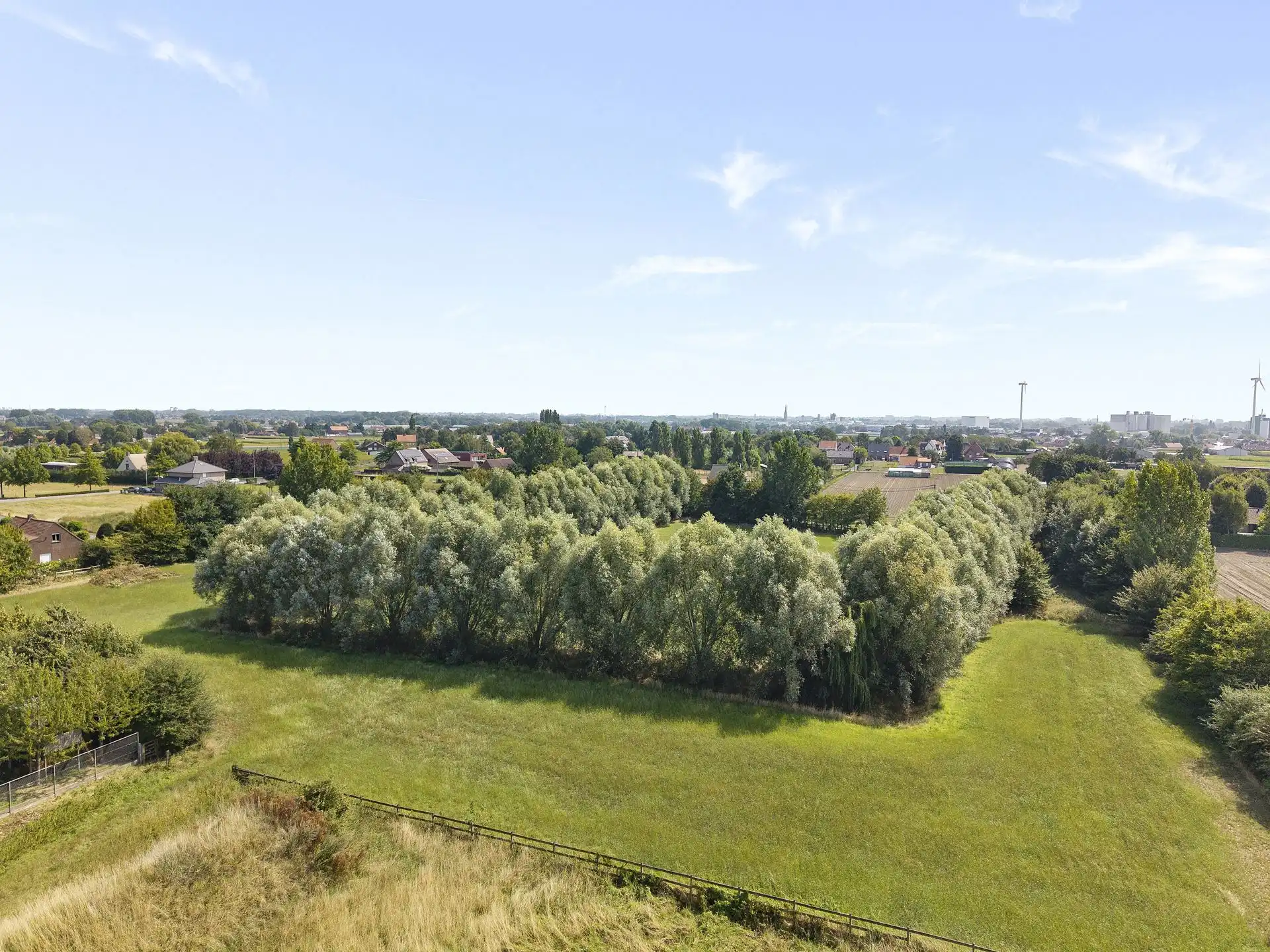 Unieke bouwgrond van 3300m2 + 2 hectare omheinde weide/tuin foto 6