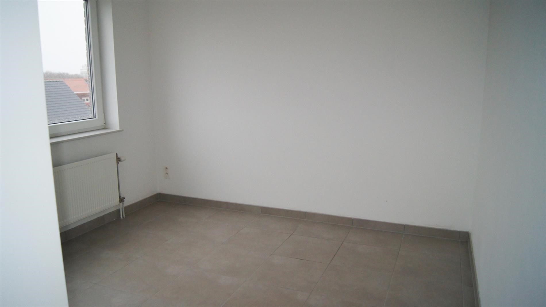 App. met 1 slpk, groot terras en garage foto 10