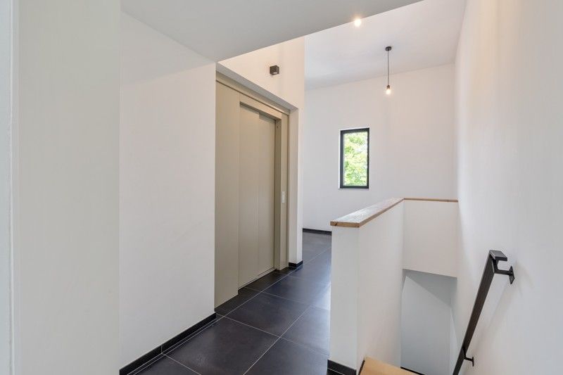 Zeer ruim en stijlvol penthouse met tuin en garage foto 25