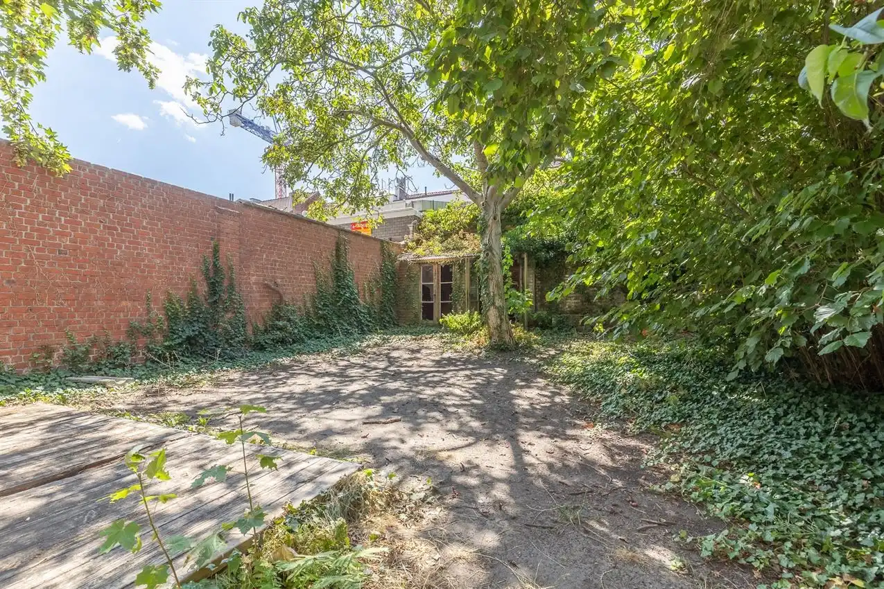 Ruim gelijkvloers appartement met zonnige tuin op toplocatie foto 2