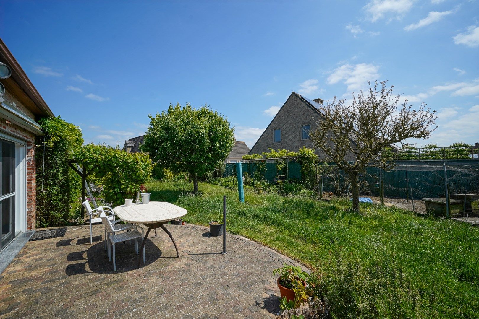 Ruime woning in Oudenburg met zongerichte tuin foto 10