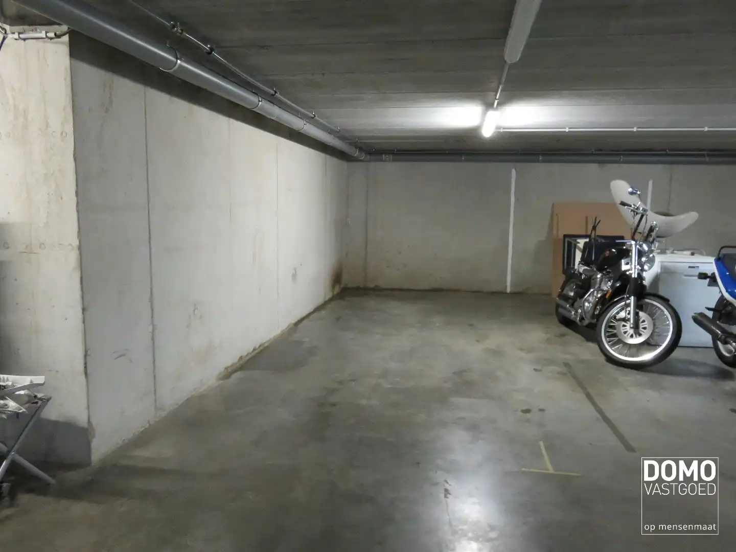 Gelijkvloers appartement met tuin en ondergrondse garage te Kermt - energielabel B -121m² bewoonbare oppervlakte foto 10