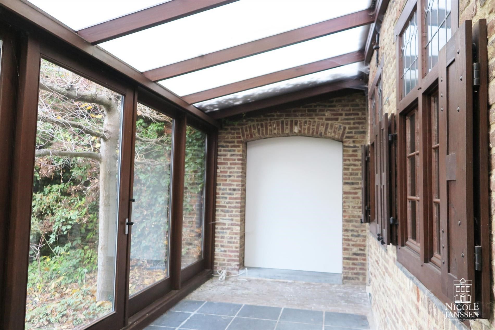 Gerenoveerde, authentieke stadsboerderij met tuin in het hartje van Maaseik foto 13