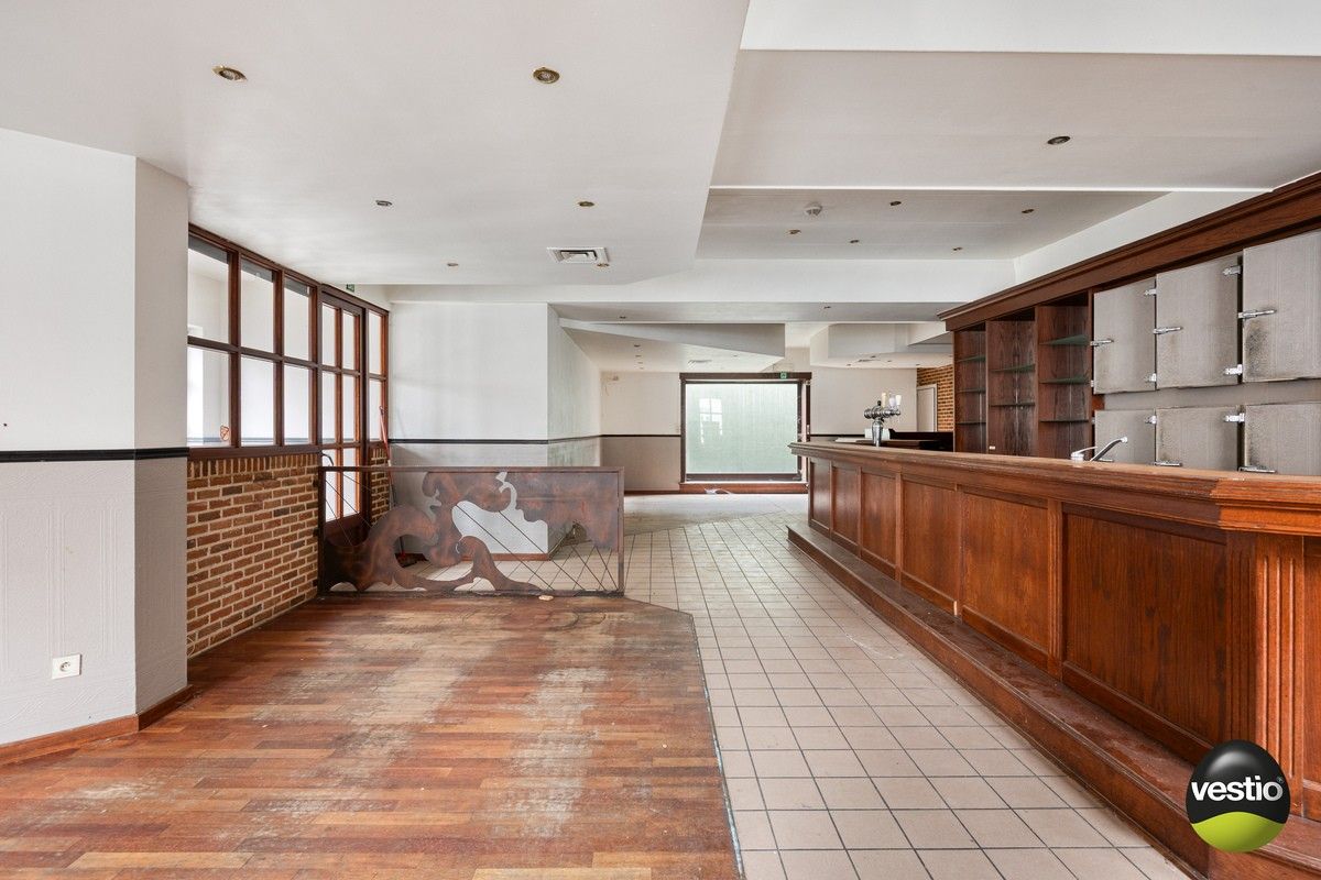 Handelspand met woonst / projectopportuniteit aan de Luikersteenweg. foto 3