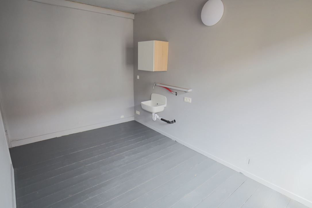 Rijwoning met drie slaapkamers foto 4