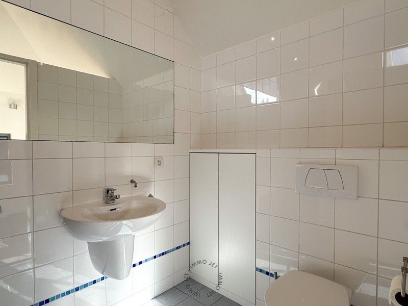 Ruime bel-etagewoning met 3 slaapkamers, tuin en garage foto 12