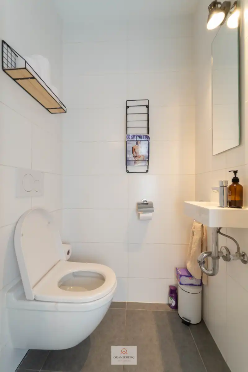Gelijkvloers 2 slaapkamerappartement met ruime tuin foto 24