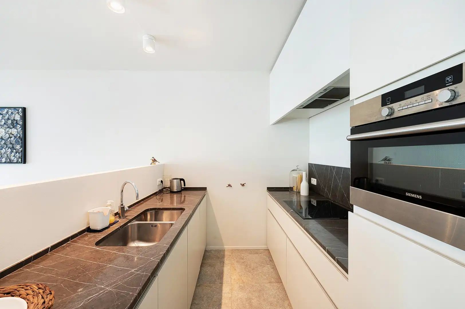 Uitzonderlijk tuinappartement met frontaal zicht op het Duinenwatermeer. foto 17