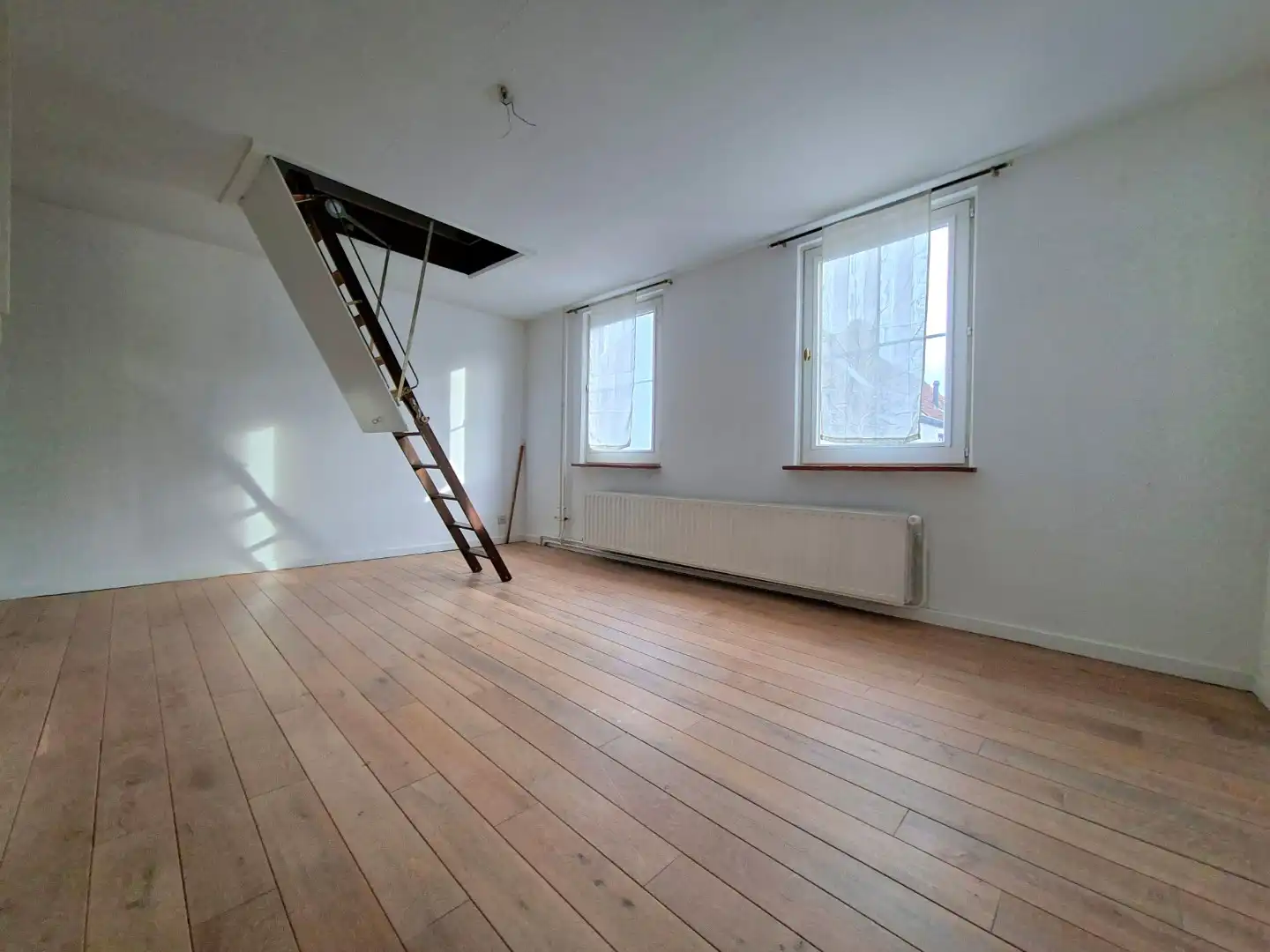 Typische Brugse woning met binnenpatio/tuintje foto 8