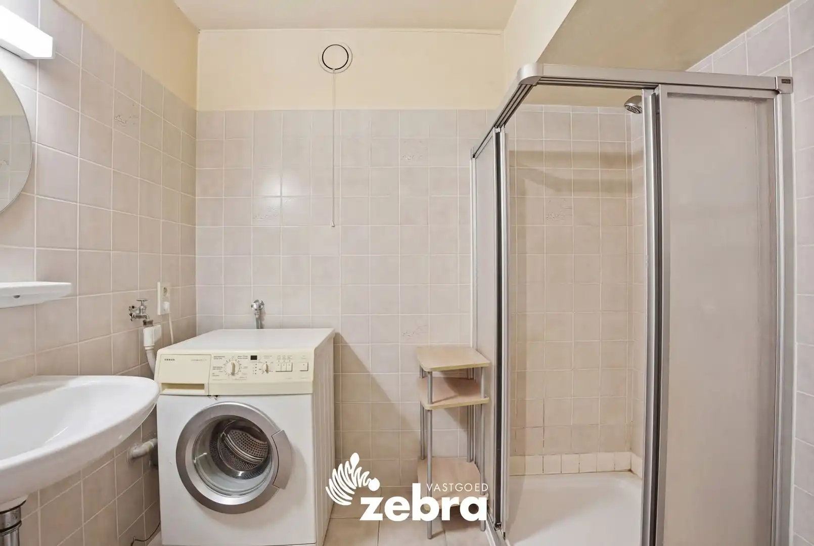 Gelijkvloers 2-slaapkamerappartement met terras en garage in centrum Tielt! foto 11