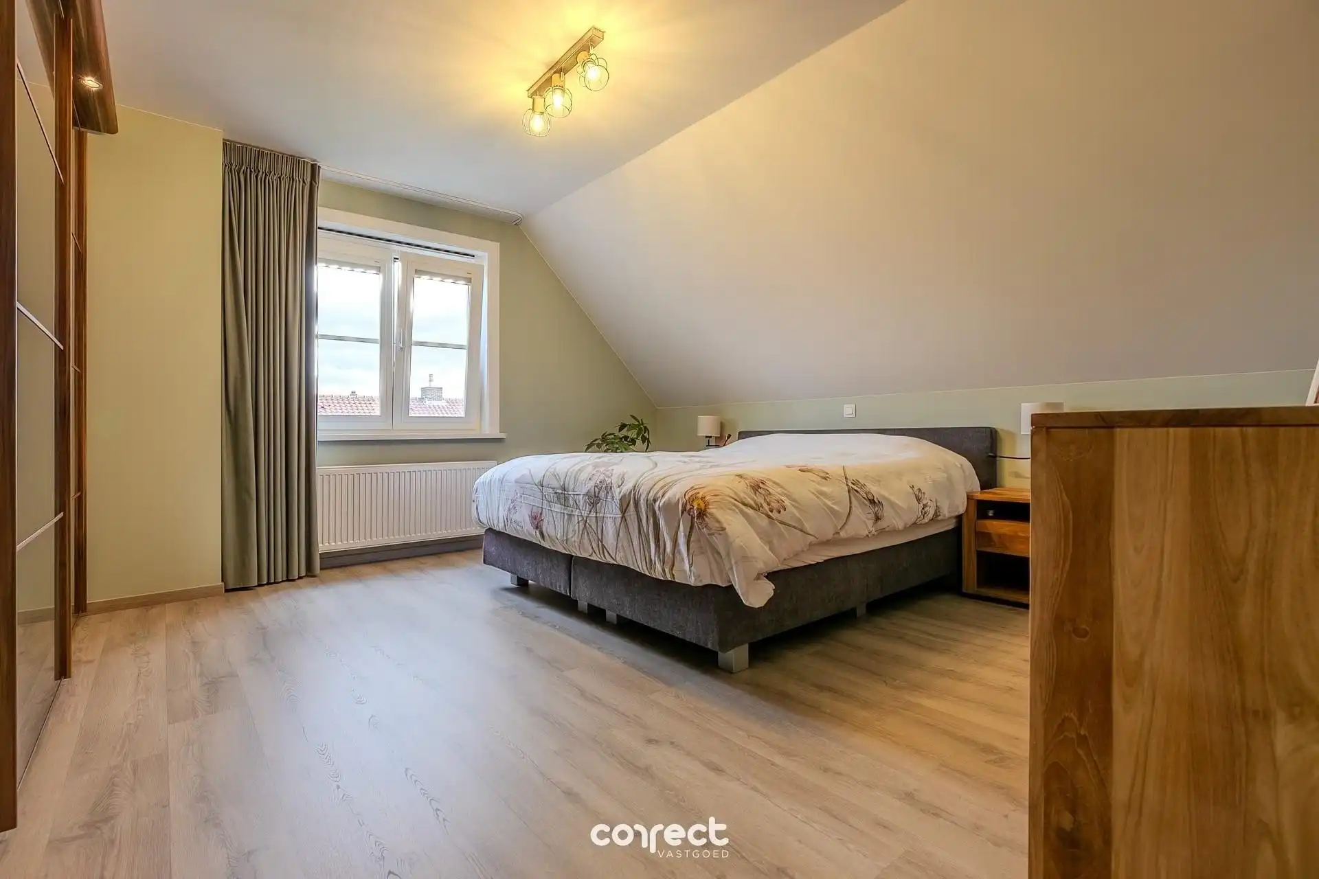 Rustig gelegen, zeer net onderhouden open bebouwing met prachtige, zongerichte tuin. foto 11