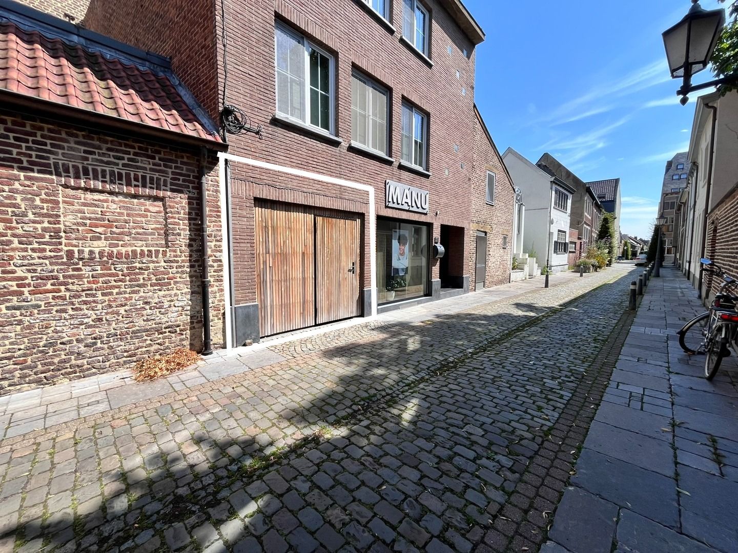 Opbrengsteigendom bestaande uit een gelijkvloers handelspand en 3 appartementen foto 3