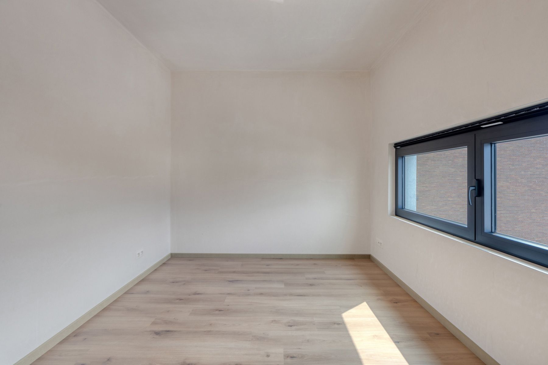 Nieuwbouw duplex appartement met ruim terras in het centrum foto 12