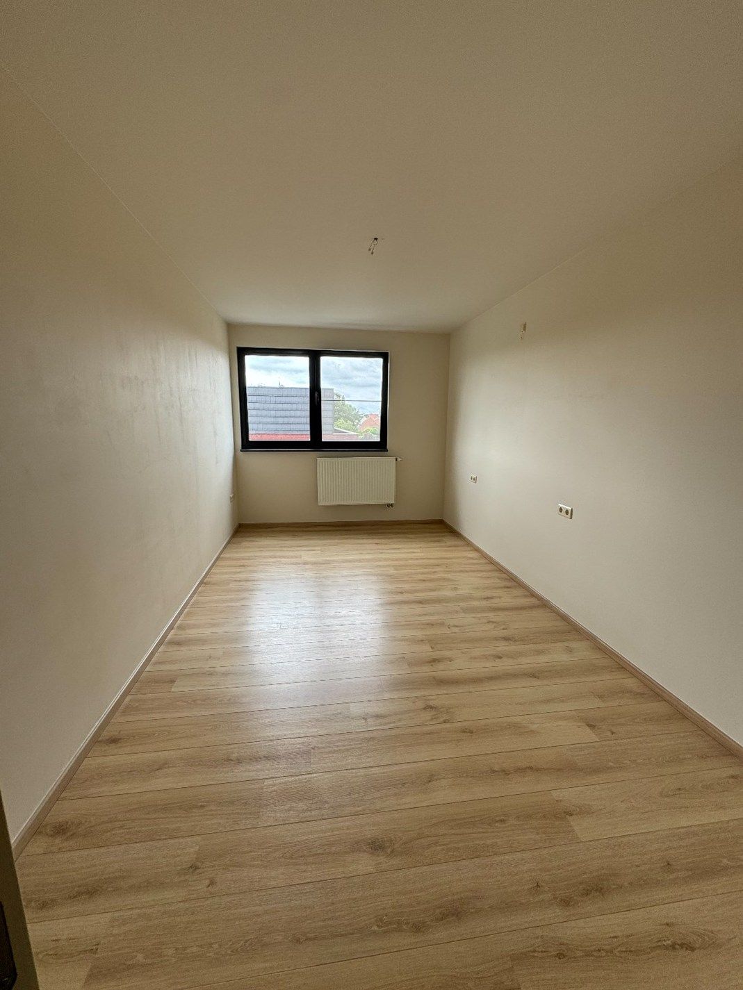 Duplex appartement met 3 slaapkamers en 2 autostaanplaatsen in hartje Beringen foto 12