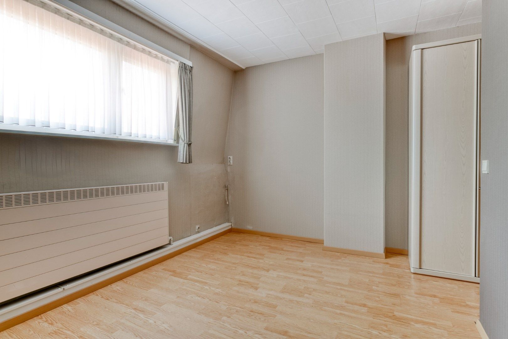 Verzorgde woning met 2 slaapkamers, prachtige tuin én garage! foto 12