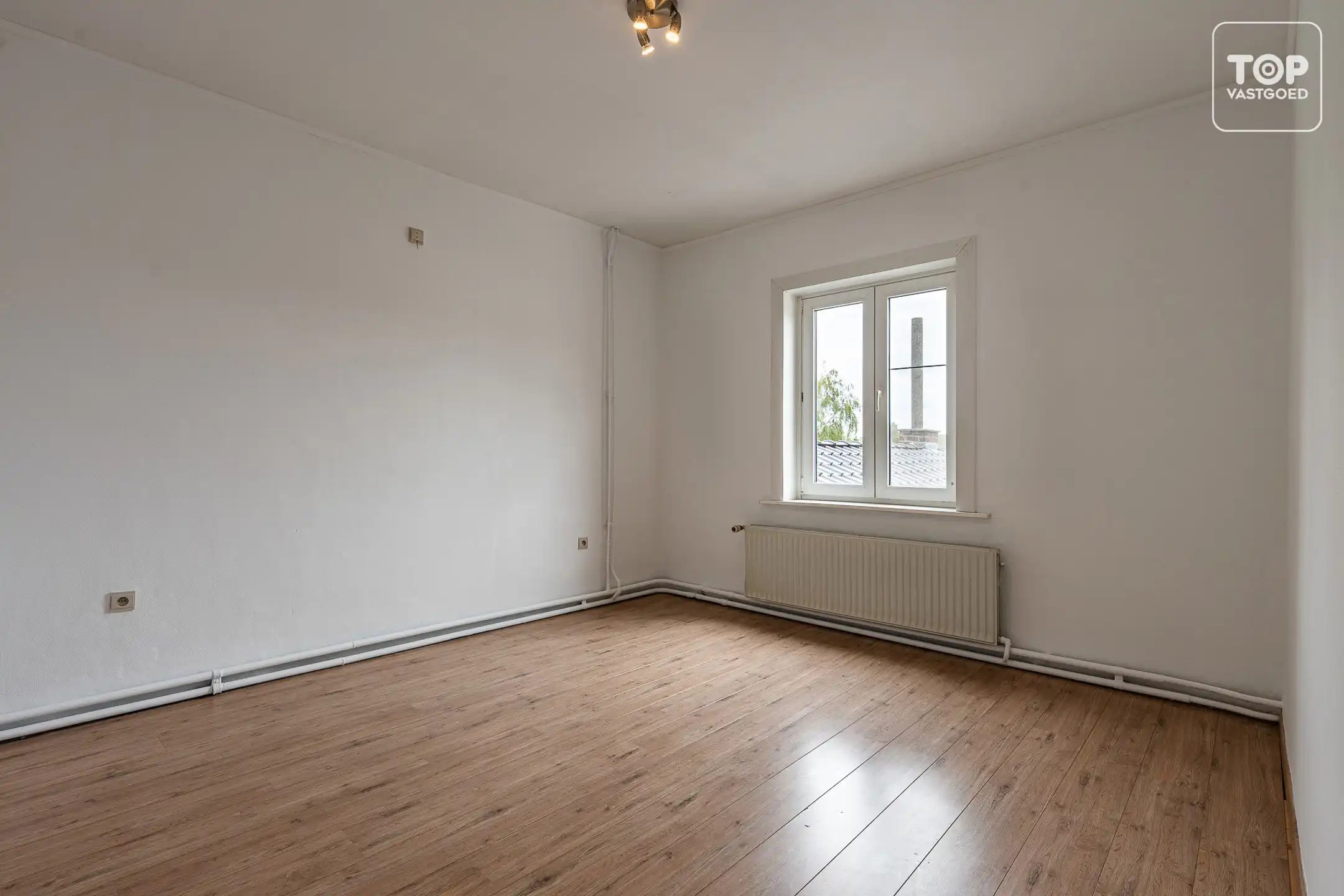 Instapklare gezinswoning met tuin en open zicht foto 16