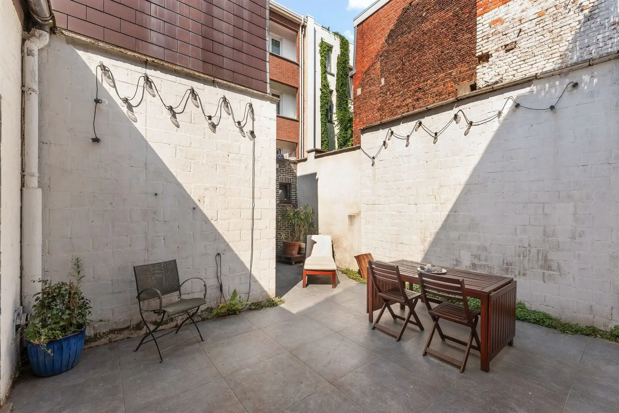Steegwoning met naastliggend atelier/opslagplaats foto 12