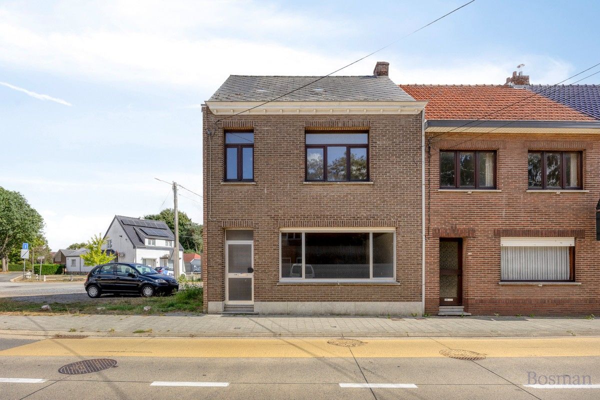 Te renoveren woning met 5 garageboxen te koop in Ham foto {{pictureIndex}}