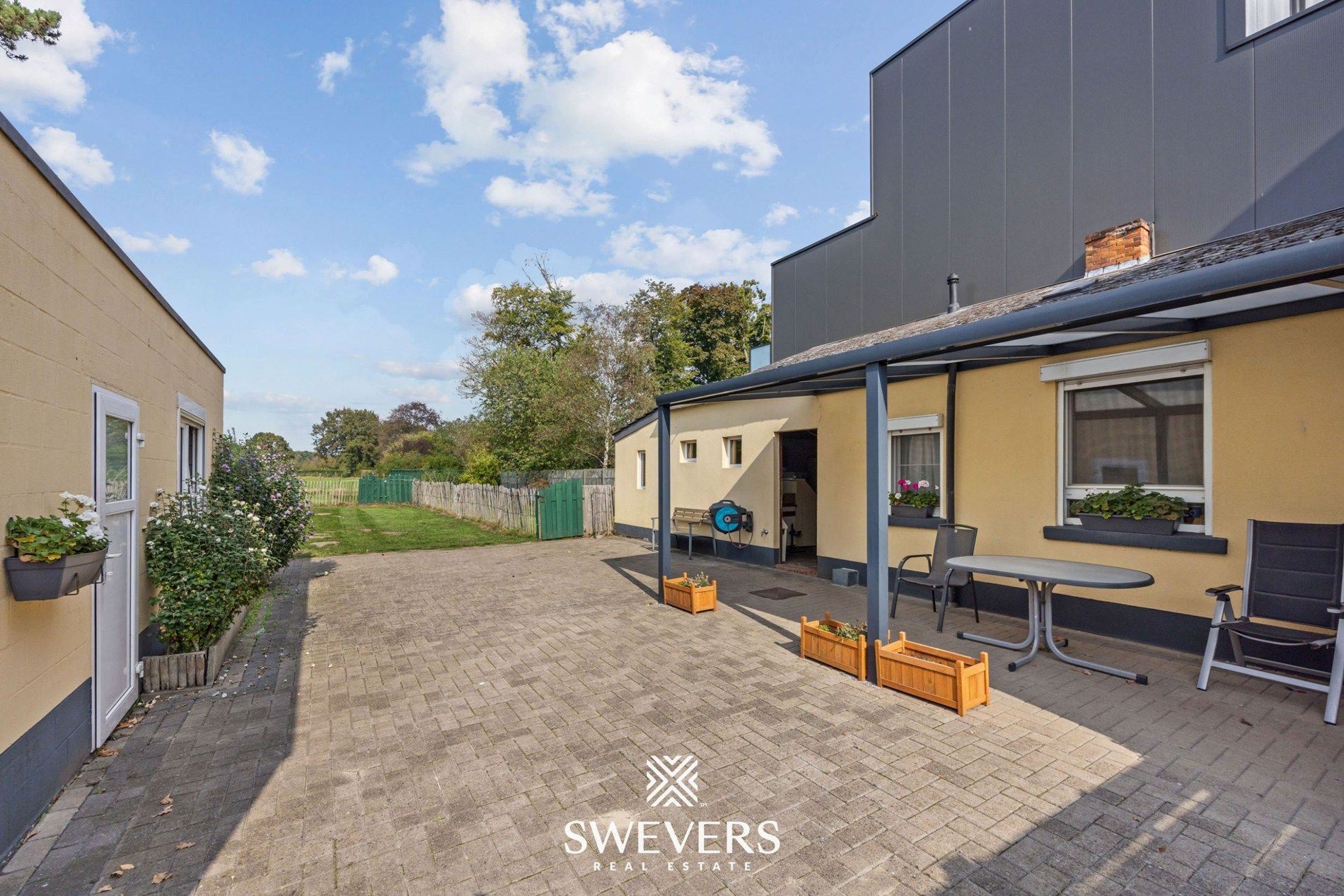 Instapklare gezinswoning met ruimte, tuin en rendement in Leopoldsburg foto 29