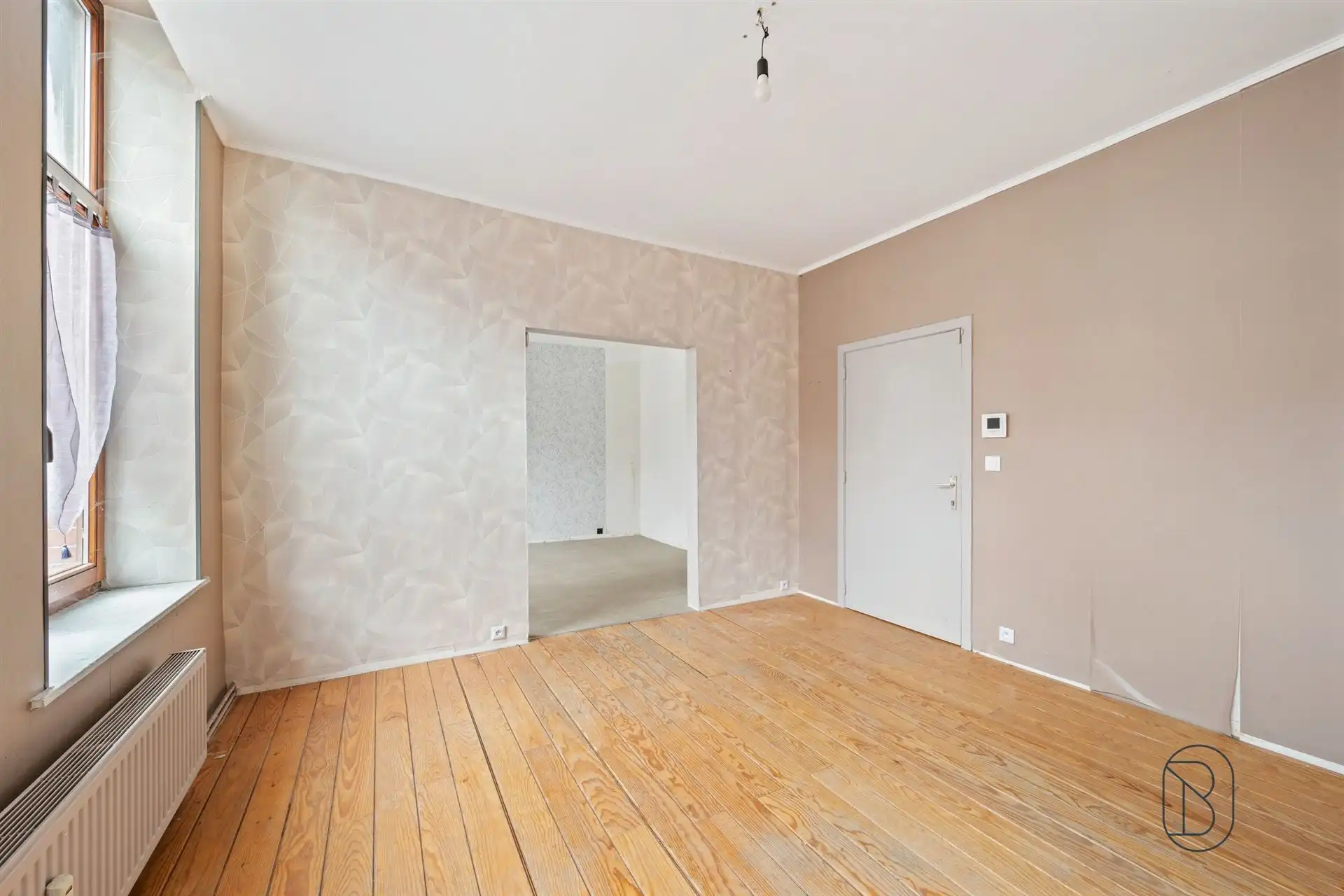 Opbrengsteigendom: handelsruimte en 2 appartementen foto 12