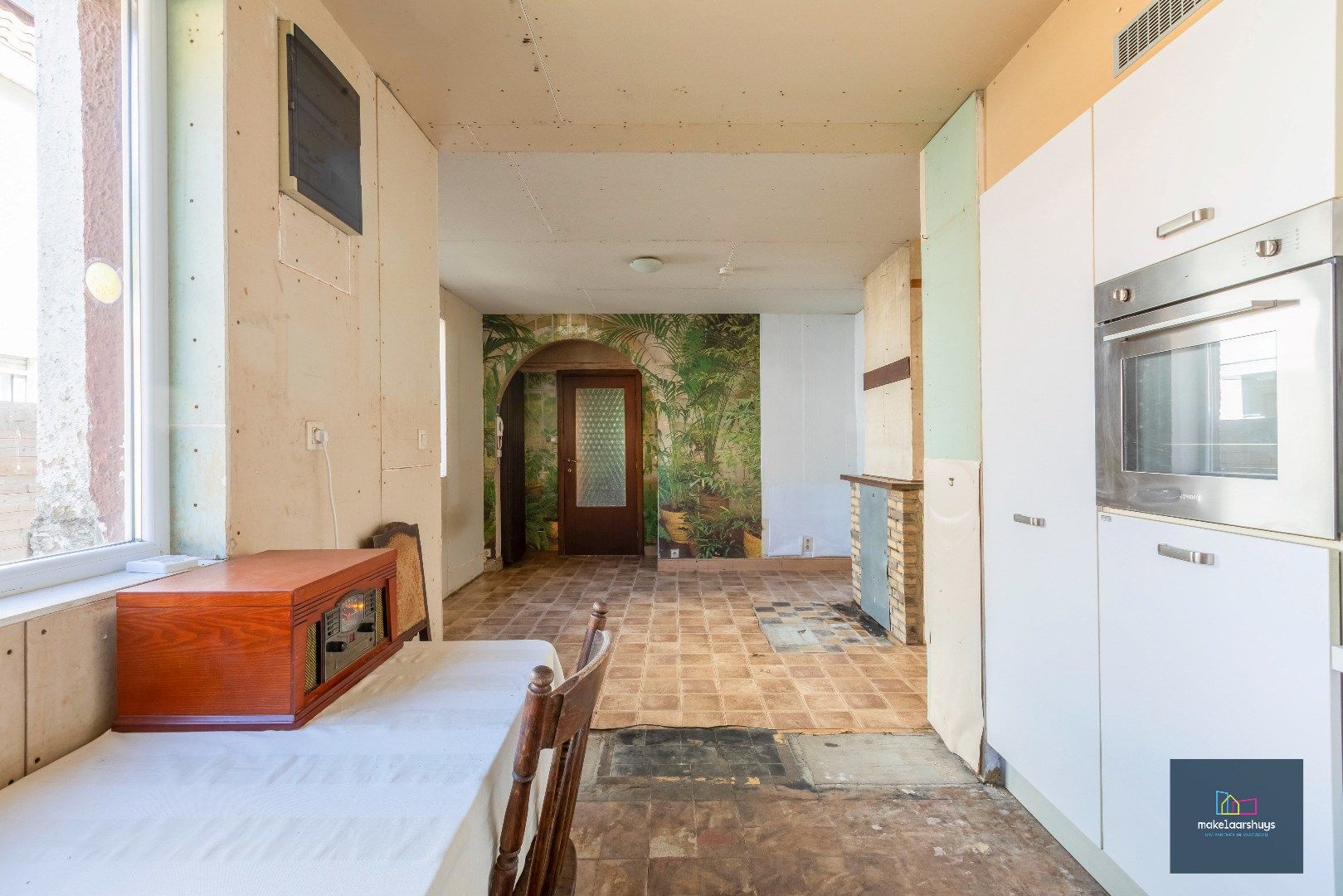 Residentieel gelegen  te renoveren halfopen bebouwing met tuin  foto 11