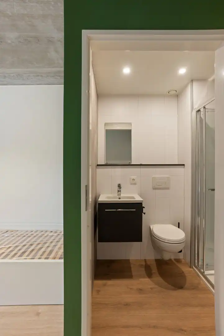 Gelijkvloerse nieuwbouwstudentenkamer met privébadkamer in hartje Kortrijk foto 7