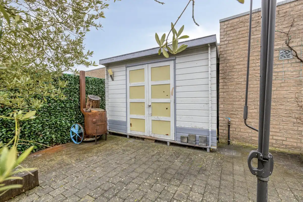 Instapklare woning met garage te koop in Bilzen foto 27