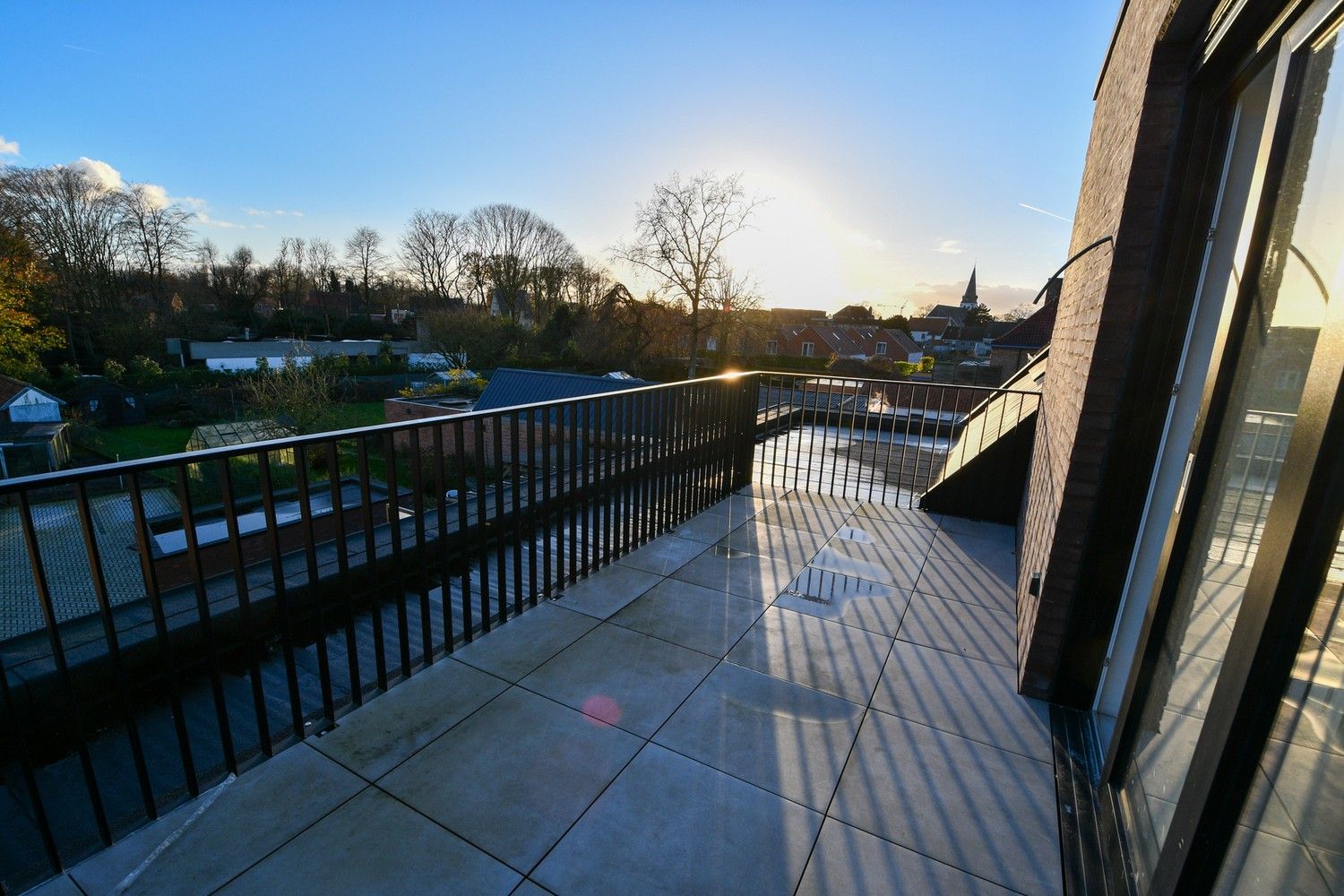 Nieuwbouwappartement met 3 slaapkamers en zon georiënteerd terras in hartje Lembeke foto 14