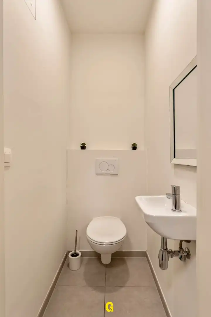 Recent energiezuinig 1-slaapkamer appartement met terras, standplaats en berging, vlak bij het centrum van Tongeren foto 9