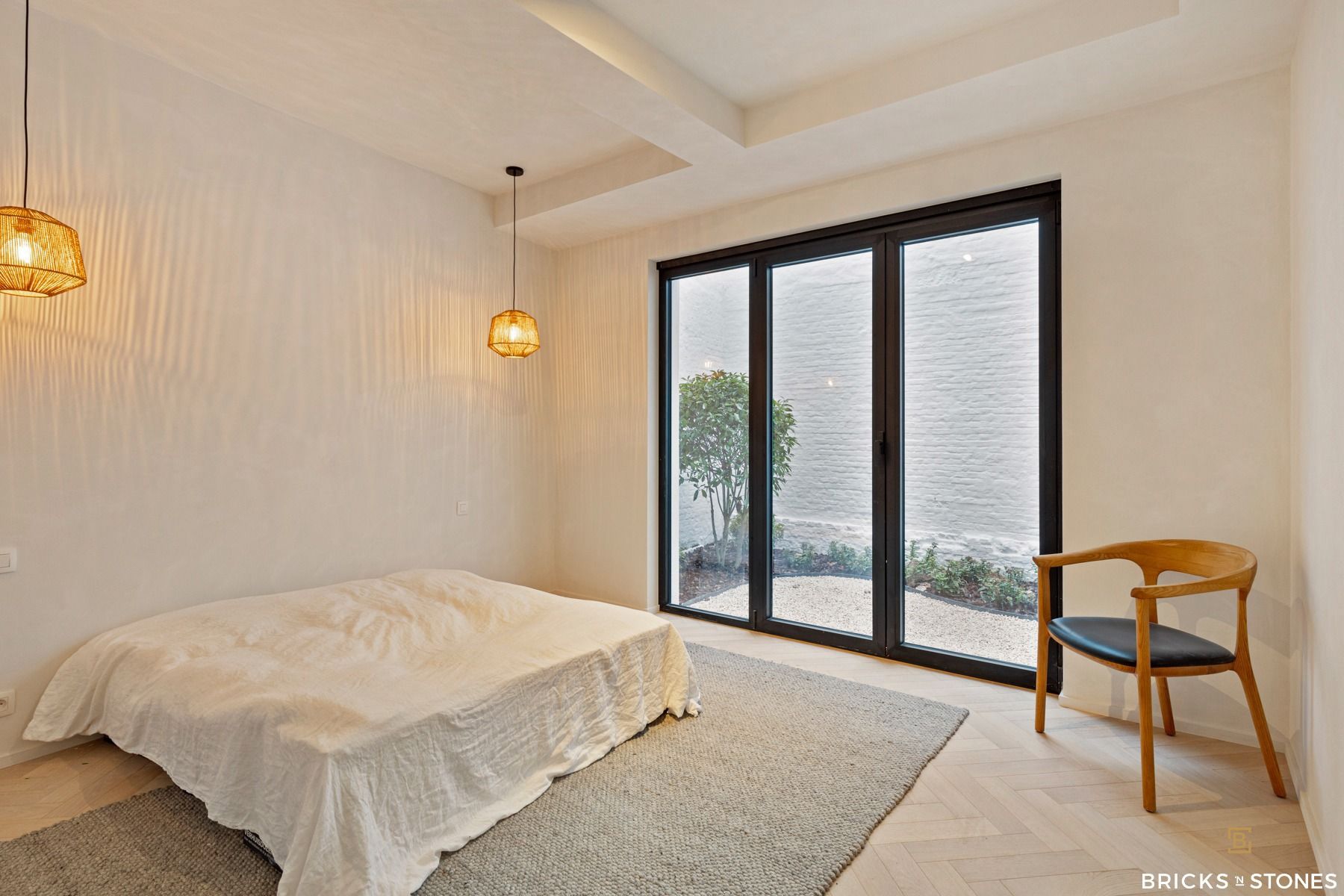 Knap gerenoveerd gelijkvloers appartement met tuin foto 11