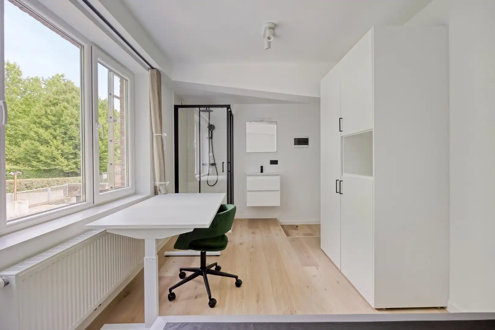 Volledig gerenoveerde studentenkamer in residentie met 15 studentenkamers en een 1slaapkamer appartement in hartje Leuven - EPC label A! foto 2