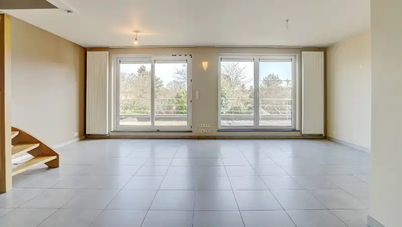 Ruim 3 slaapkamer appartement van 130m² met terras 14m² op zuid-oosten foto 2