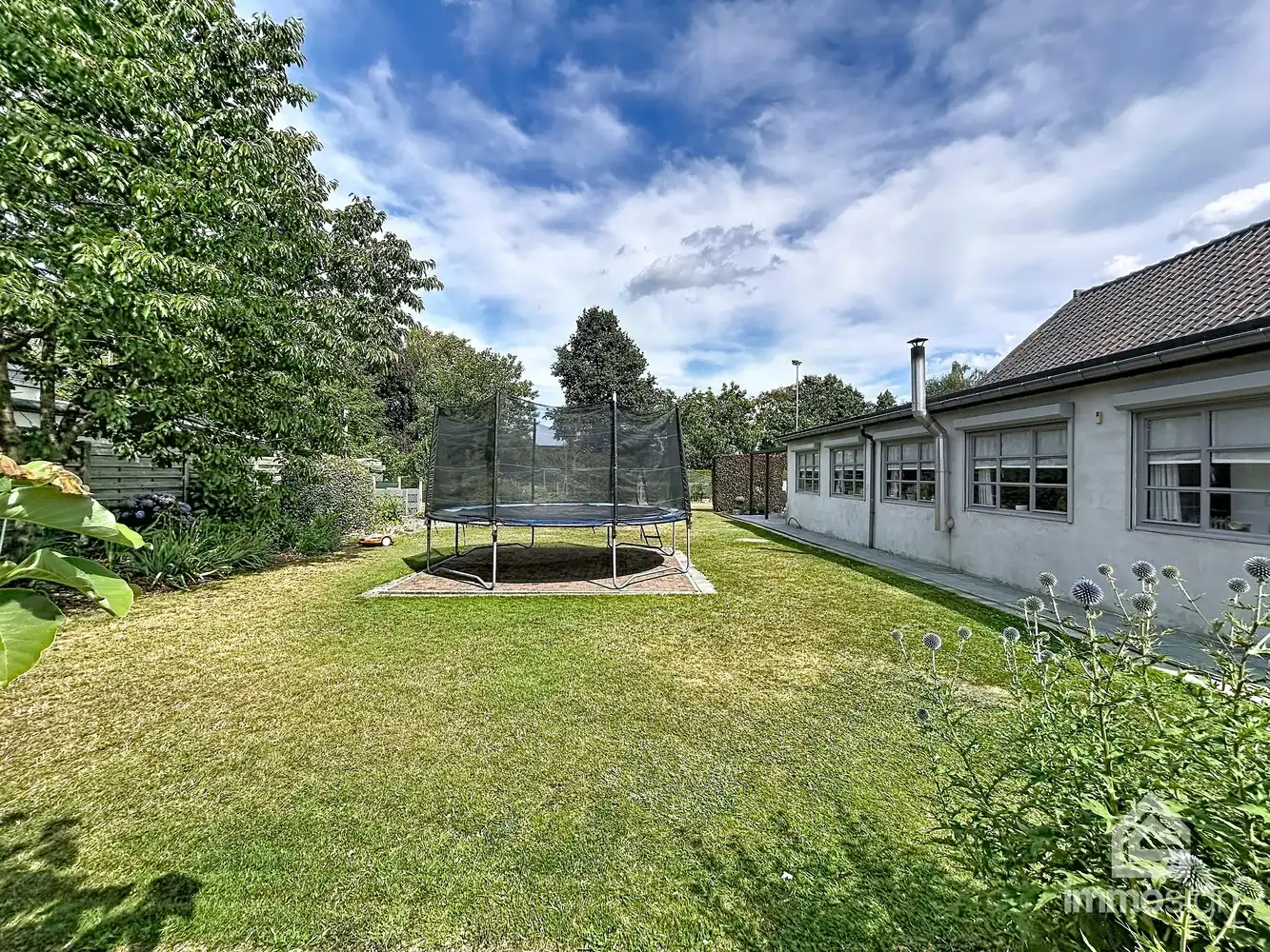 Ruime woning op bijna 2.000 m² grond met dubbele garage en werkhuis foto 48