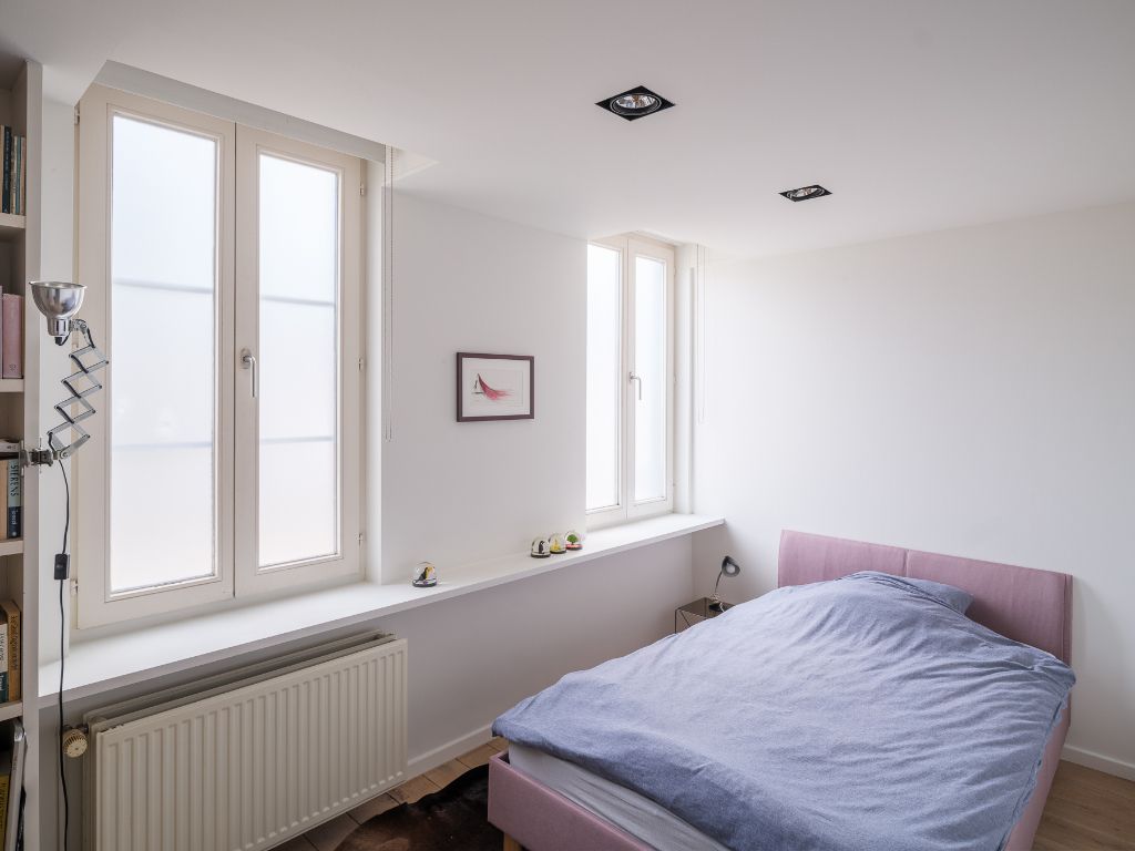 Centrum Gent - Een architecturale hoekwoning met een exeptionele ruimtelijkheid, twee slaapkamers en twee buitenruimtes. foto 11