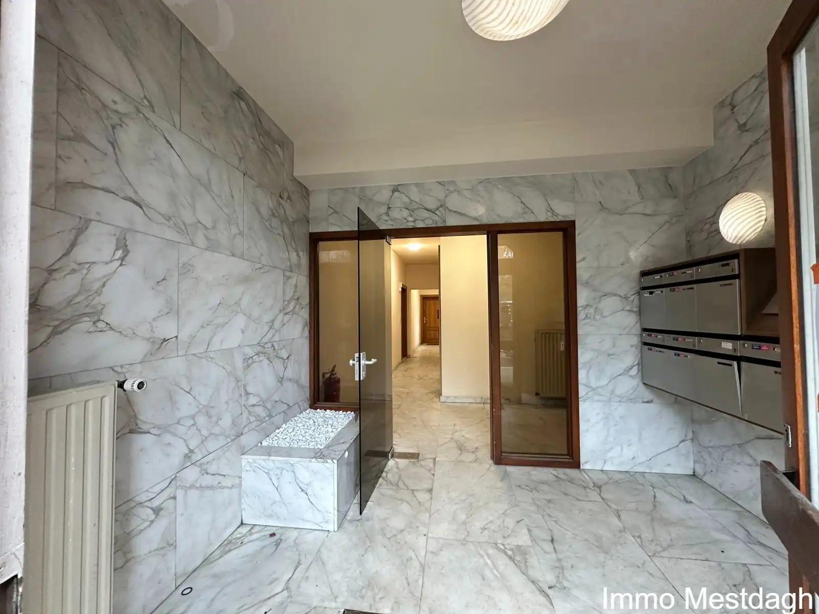 Royaal appartement met garagebox en zicht op de Schaffense Poort. foto 28