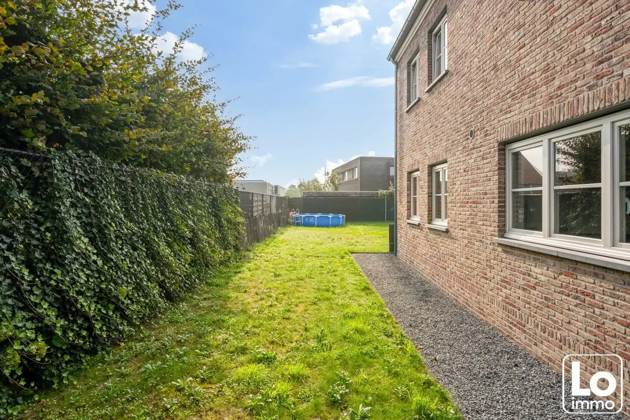Instap klare ruime open woning met inpandige garage en een zuid georiënteerde tuin op een toplocatie nabij het centrum van Lochristi! foto 24