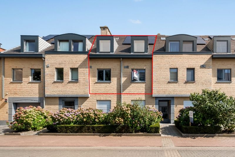 Ruim 3 slaapkamer duplex-appartement van 130m² met terras op zuid-oosten, ondergrondse staanplaats en kelder foto 11