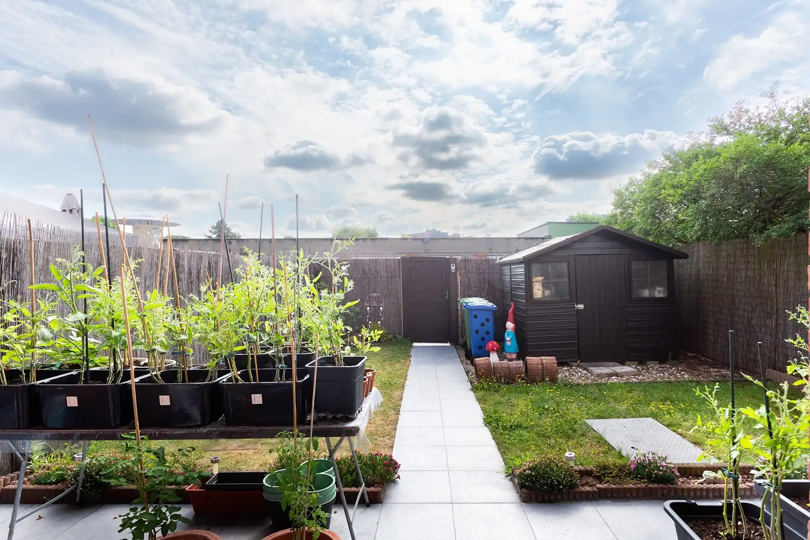 Opbrengsteigendom met 6 appartementen en 9 garageboxen foto 6