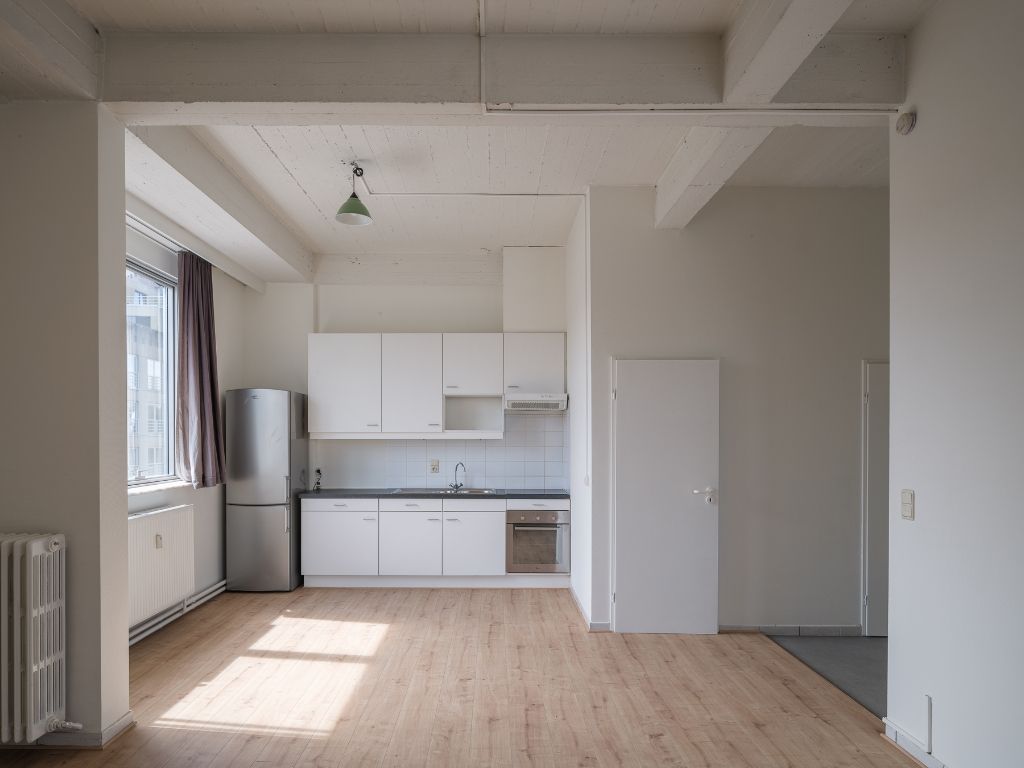 Unieke, lichtrijke cityflat nabij de Coupure foto 7