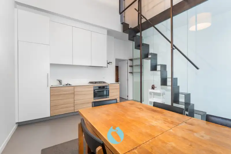 Instapklare stadswoning met 2 slaapkamers, bureauruimte en tuin foto 9