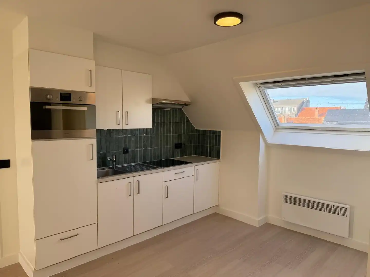 Zonnige dakstudio in een rustige wijk nabij de Nieuwpoortsesteenweg foto 3