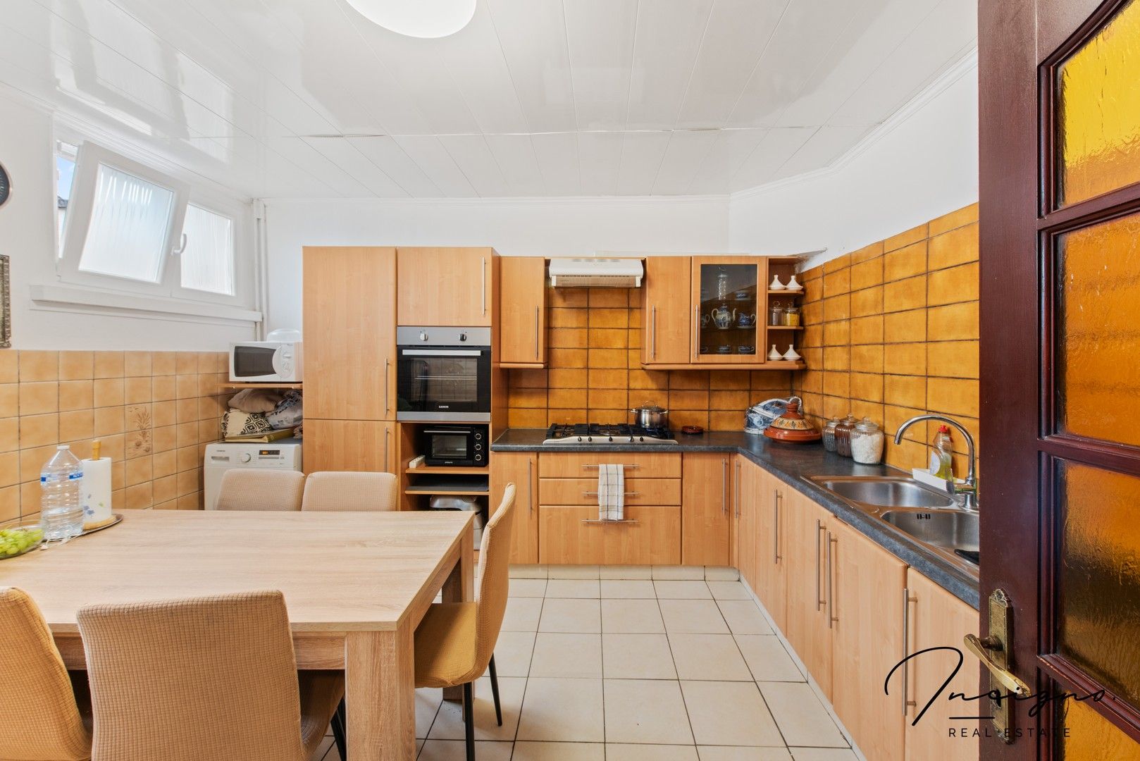 Op te frissen rijwoning met 4 slaapkamers & stadskoer foto 7